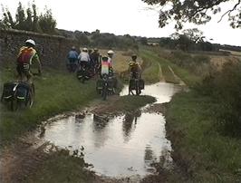 The muddy lake at the start of the 3-mile track from North Creek / South Creek to Stanhoe, known as Holgate Road